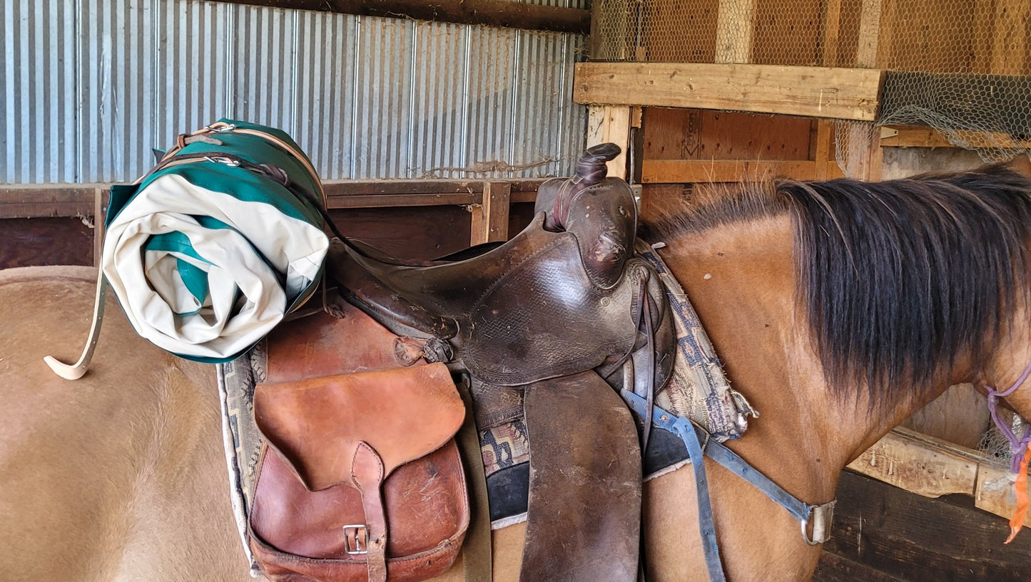 bedroll on riding saddle