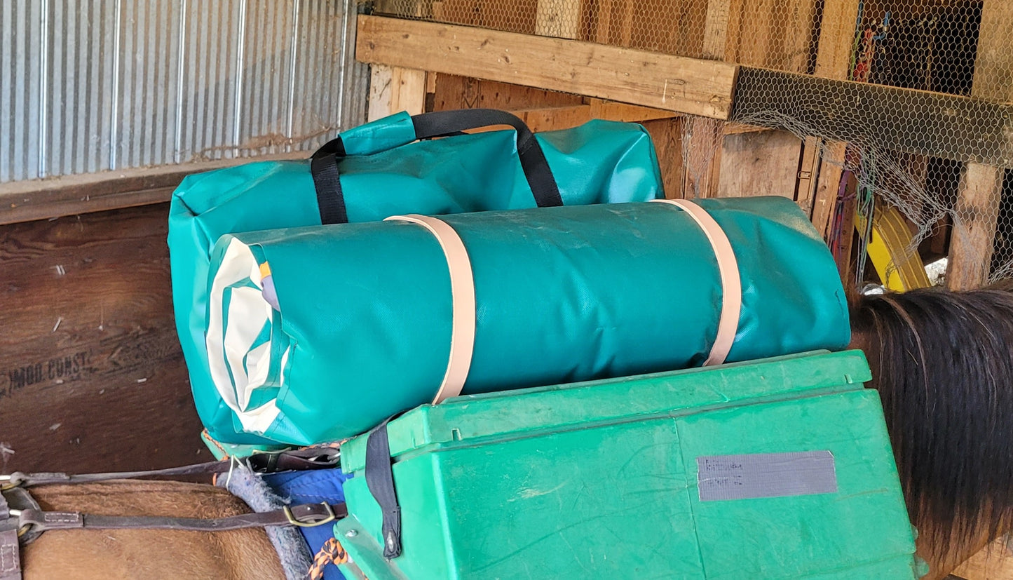 bedroll and gearbag on pack saddle